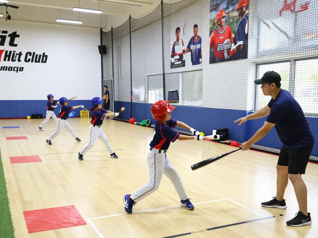 Hitclub baseball training session with young athletes practicing batting techniques
